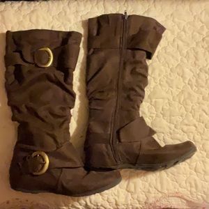Journee Collection high calf brown suede fashion boots w heathered gold buckles.